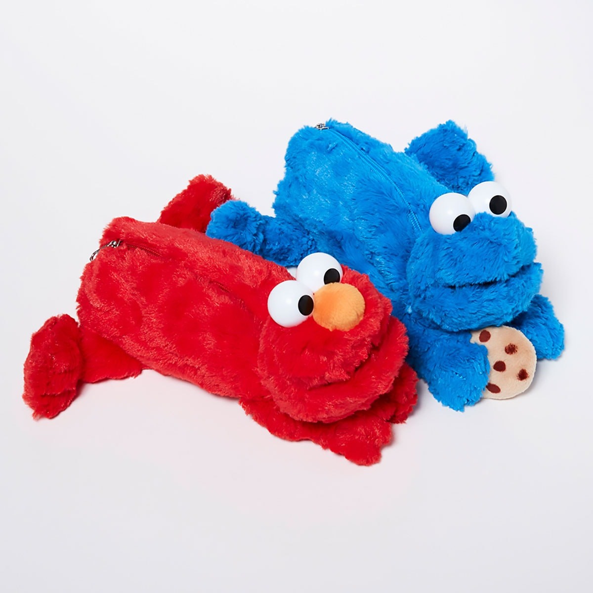 エルモとクッキーモンスターのペンケース - Slide:1