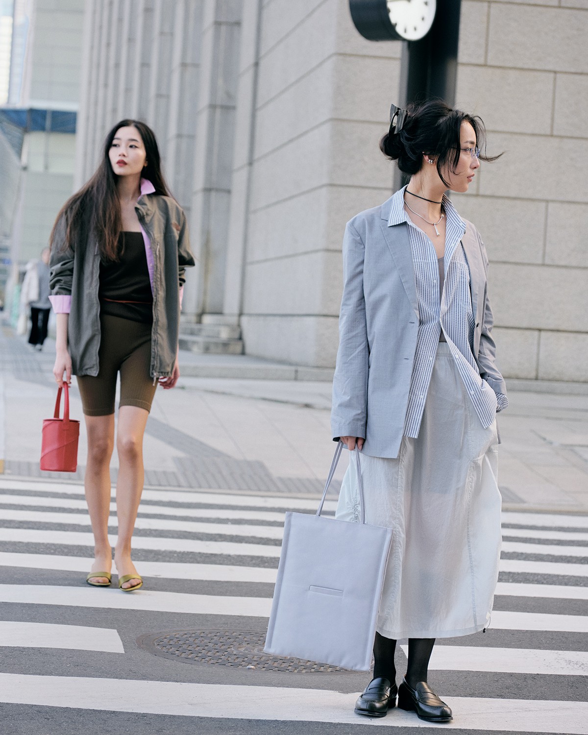 すれ違う2人の装い THE NORTH FACE「General Athletic Recreation」