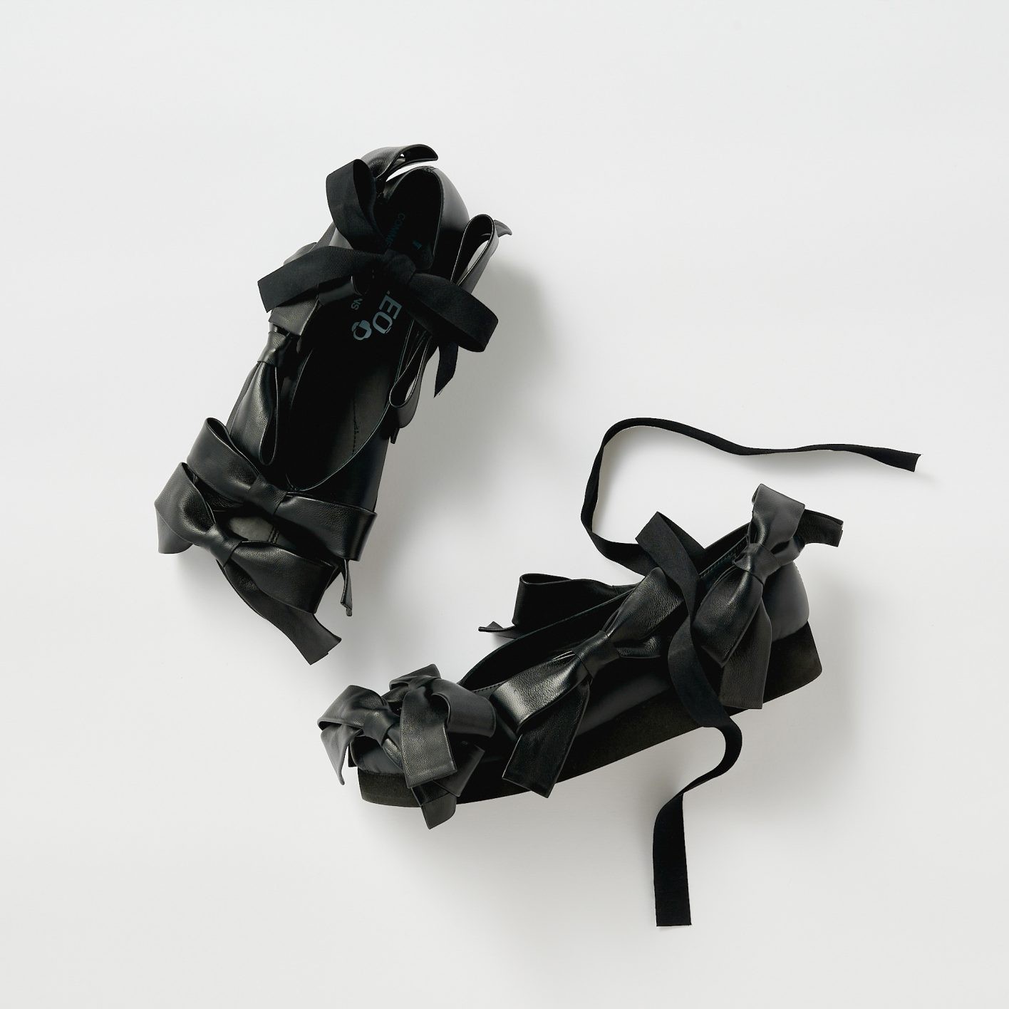 コム デ ギャルソン × フィレオのシューズ