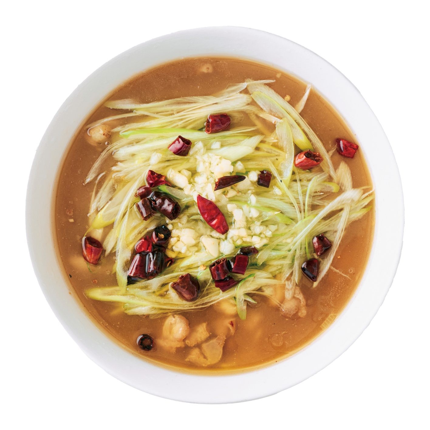 「龍門に来たら頼まずにはいられない。遅い時間までやっているので、ライヴ後など日常的に困ったらここ!」(本田千尋)。これを目当てに訪れる客も多い名物メニューのひとつ、鶏肉の葱油かけそば ¥850。